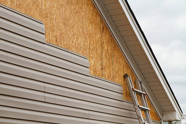 Professional Emergency Siding Repair technician working in Worcester, MA